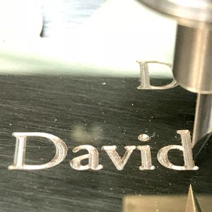 engravbing a brass plaque